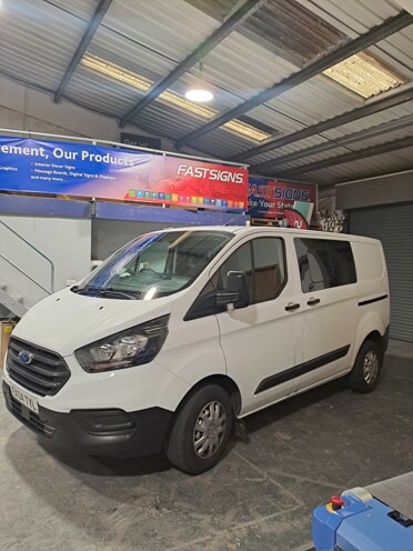 An image of the white Ek Tiling van before vehicle graphics and wraps